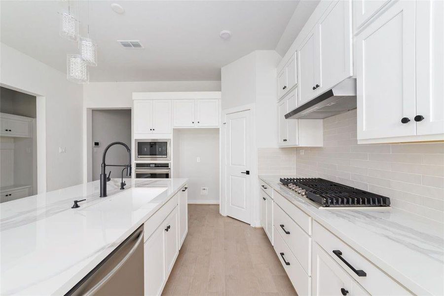 Furnished interior view inside a new home in Elyson 45' & 70', Katy (Image 6).