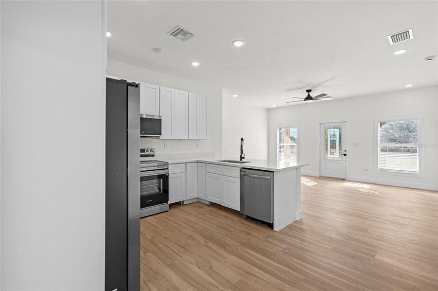 Furnished interior view inside a new home in , Okeechobee (Image 12).