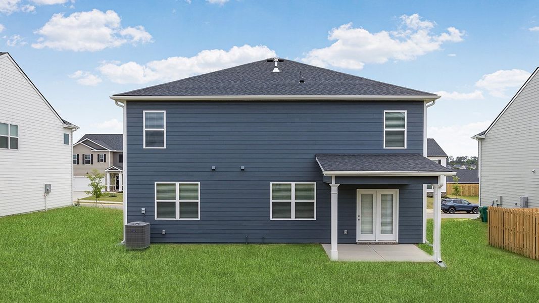 Exterior details and patio area of a home in Estates at Deer Hollow, Grovetown (Image 2).