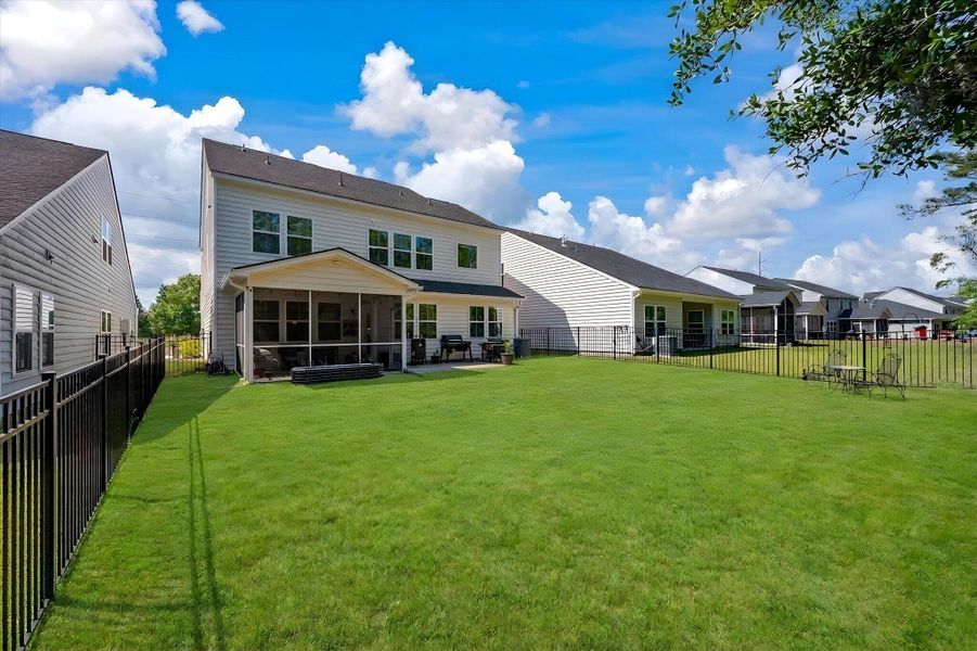 Exterior details and patio area of a home in , Johns Island (Image 4).