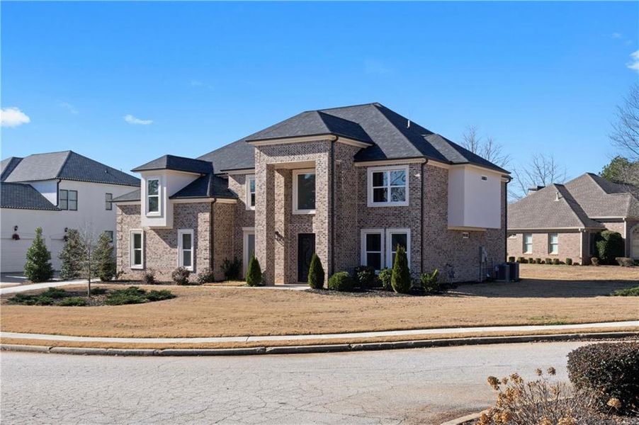 Front exterior of a new home in , Lithonia, GA, highlighting curb appeal (Image 25).