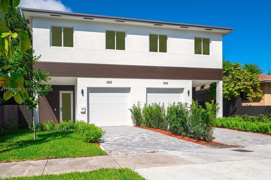 Front exterior of a new home in , Miami, FL, highlighting curb appeal (Image 22).