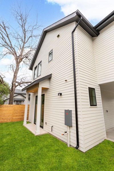 Back of property featuring a patio area