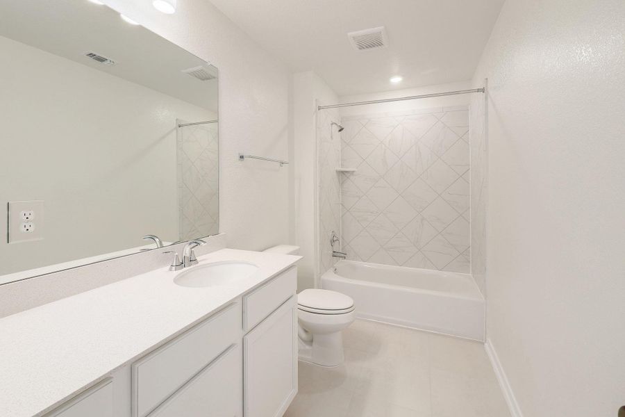 Furnished interior view inside a new home in River Bluff, Leander (Image 10).