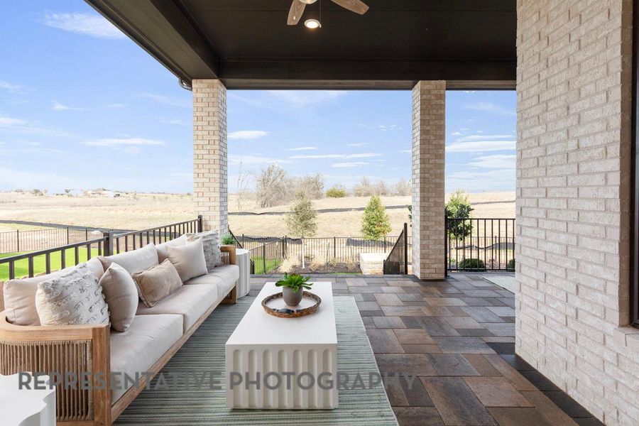 View of patio with ceiling fan, an outdoor living space, and a view of rural / pastoral area View of patio with ceiling fan, an outdoor living space, and a view of rural / pastoral area