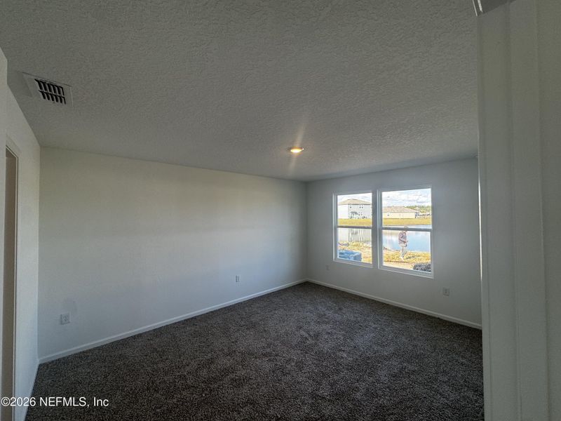 Spacious, unfurnished interior of a new home in The Arbors, Jacksonville (Image 38).