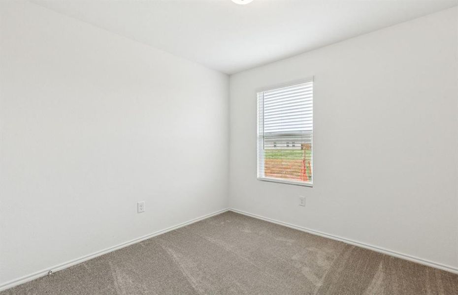 Secondary bedroom designed for comfort and convenience