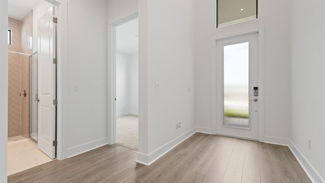 Furnished interior view inside a new home in L'Ambiance at Avenir, Palm Beach Gardens (Image 32).