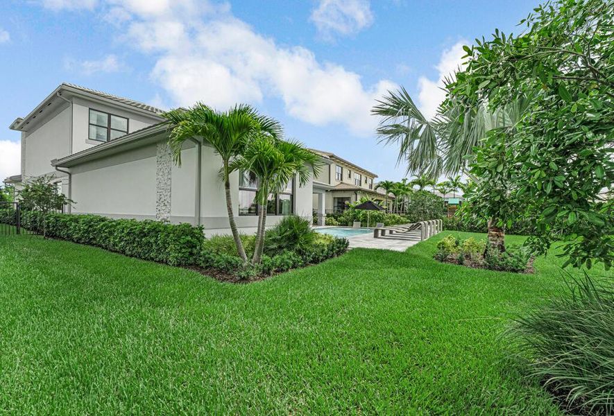 Exterior details and patio area of a home in Apex at Avenir, Palm Beach Gardens (Image 38).