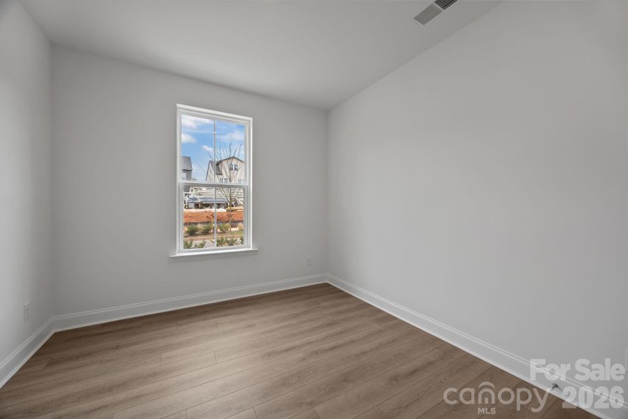 Spacious, unfurnished interior of a new home in The River District Townhomes, Charlotte (Image 19).