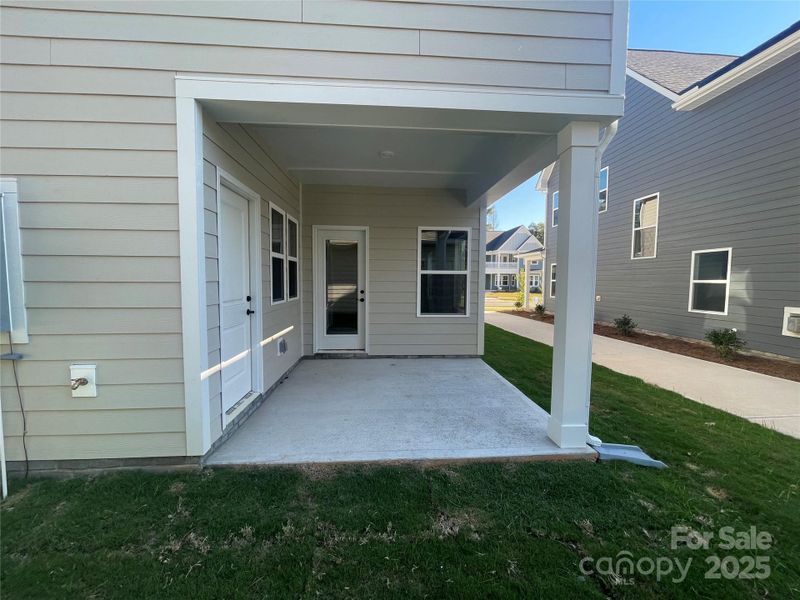 Exterior details and patio area of a home in Arbor Village, Matthews (Image 11).