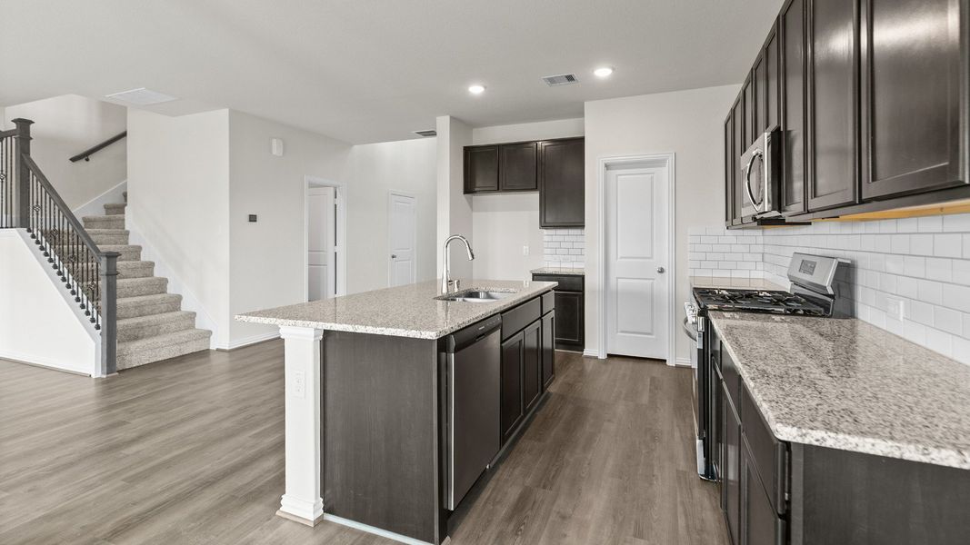 Representative furnished interior of a home built from the Southfork by Brightland Homes in Sunterra, Katy (Image 8).