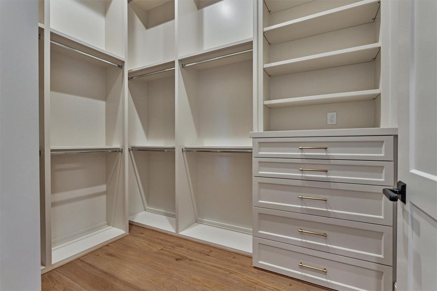 Massive primary closet with built-ins. Massive primary closet with built-ins.