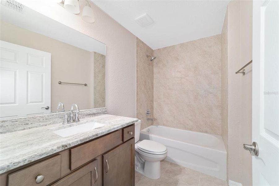 Furnished interior view inside a new home in , Dunnellon (Image 7).