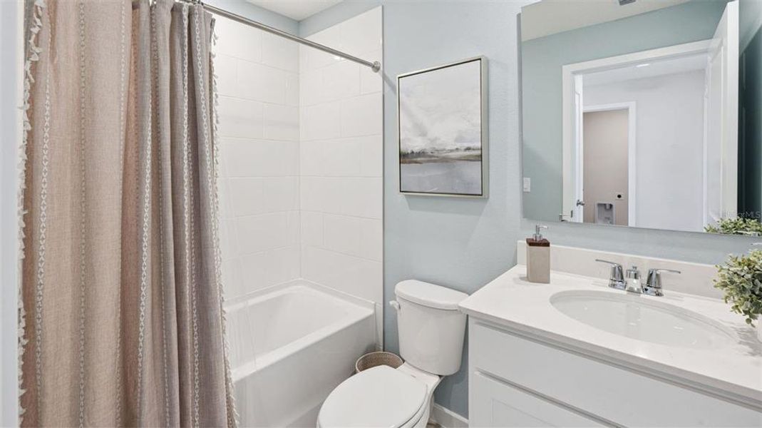 Furnished interior view inside a new home in Fish Lake Cove, Kissimmee (Image 5).
