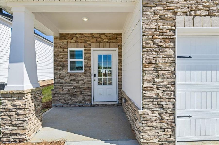 Exterior details and patio area of a home in Martin Springs - Reserve Series, Lawrenceville (Image 32).