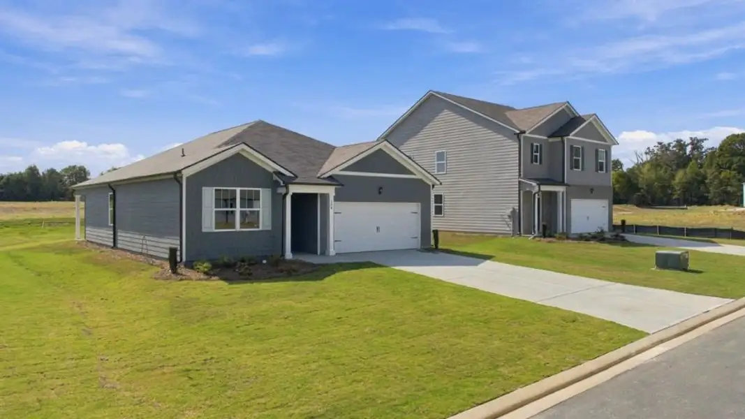 Front exterior of a new home in Northberry, Rome, GA, highlighting curb appeal (Image 2). Front exterior of a new home in Northberry, Rome, GA, highlighting curb appeal (Image 2).