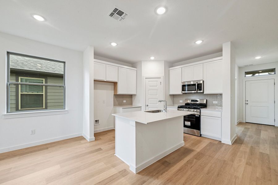 Furnished interior view inside a new home in Prairie Winds, Hutto (Image 7).