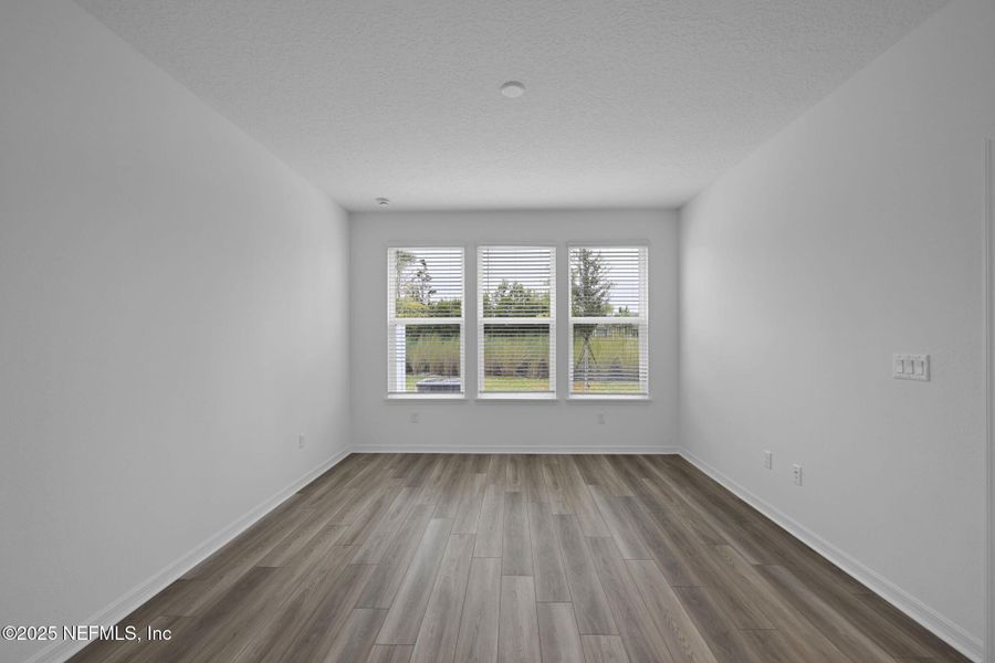 Spacious, unfurnished interior of a new home in Del Webb Wildlight, Yulee (Image 26).