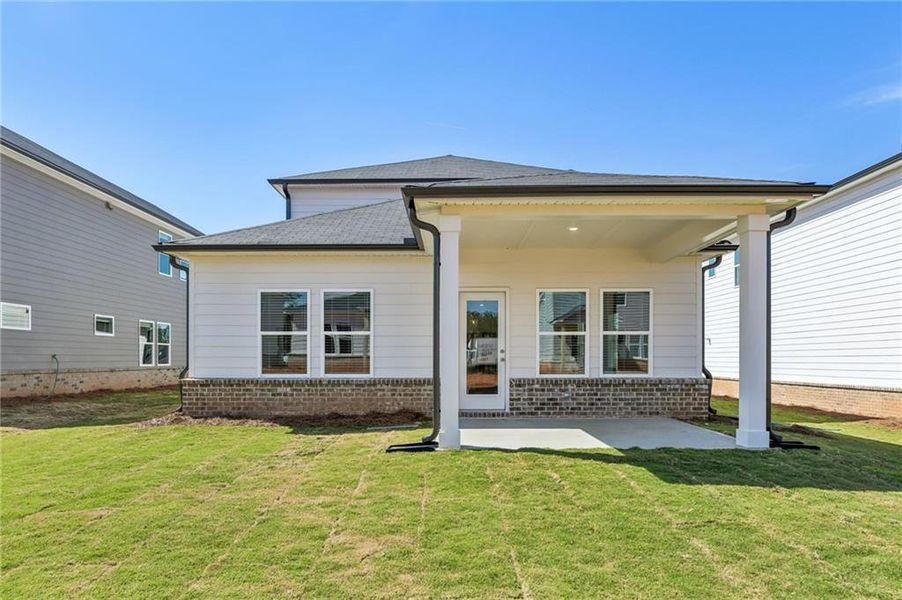 Exterior details and patio area of a home in Martin Springs - Reserve Series, Lawrenceville (Image 27).