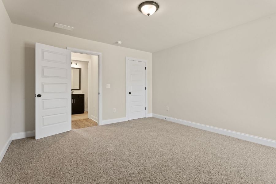 Spacious, unfurnished interior of a new home in Cherokee Knoll, Williamston (Image 25).