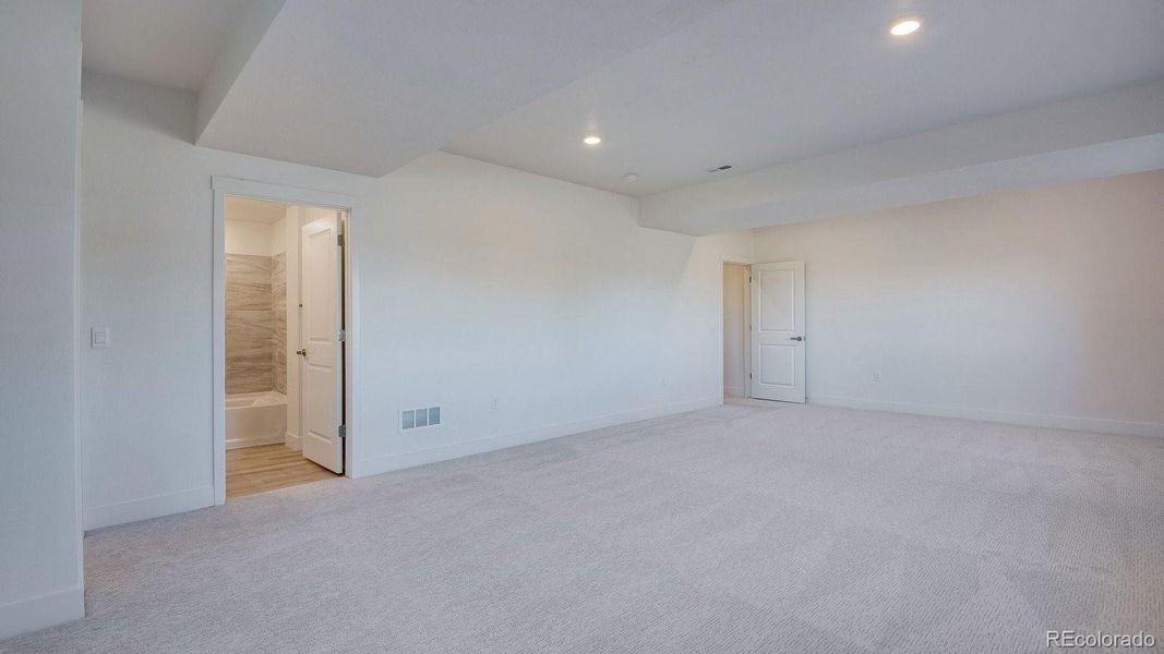 Spacious, unfurnished interior of a new home in Trails at Crowfoot, Parker (Image 34).