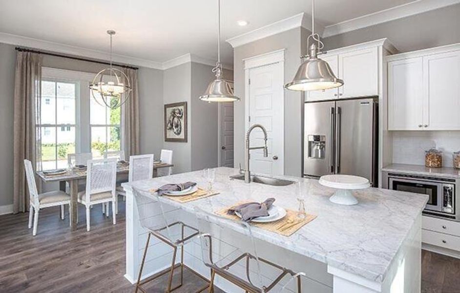 Furnished interior view inside a new home in Carnes Crossroads: Row Collection, Summerville (Image 3). Furnished interior view inside a new home in Carnes Crossroads: Row Collection, Summerville (Image 3).