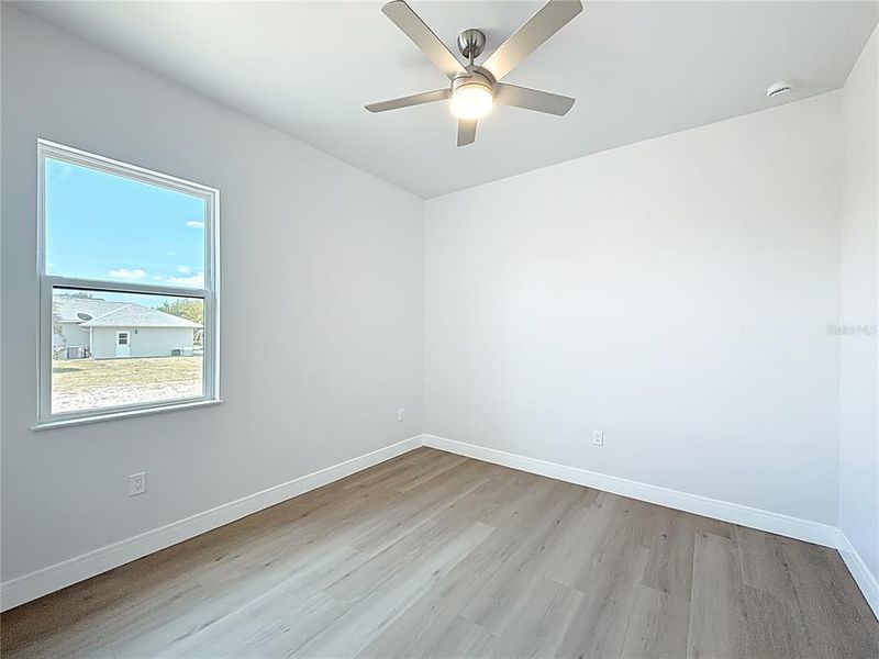 Spacious, unfurnished interior of a new home in , Port Charlotte (Image 19).