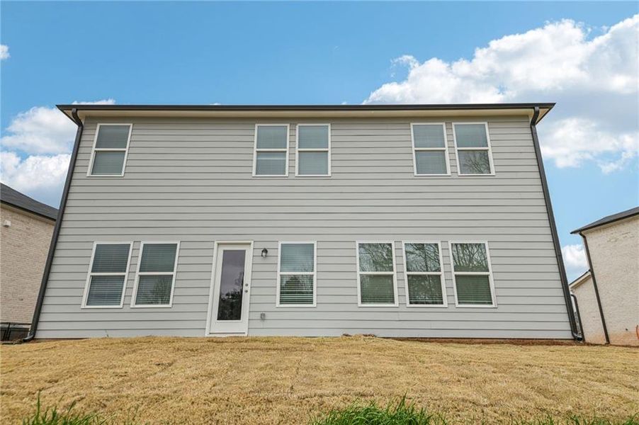 Exterior details and patio area of a home in Creekside at Oxford Park, Fairburn (Image 4). Exterior details and patio area of a home in Creekside at Oxford Park, Fairburn (Image 4).
