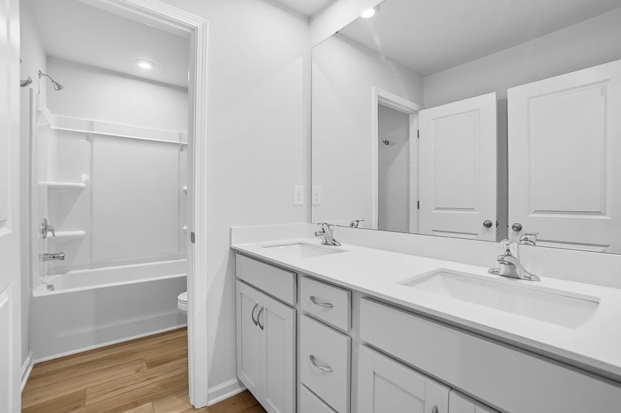 Furnished interior view inside a new home in Waxhaw Landing, Monroe (Image 11).
