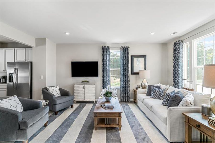 Furnished interior view inside a new home in The Mills at Rocky River Townhomes, Concord (Image 8). Furnished interior view inside a new home in The Mills at Rocky River Townhomes, Concord (Image 8).
