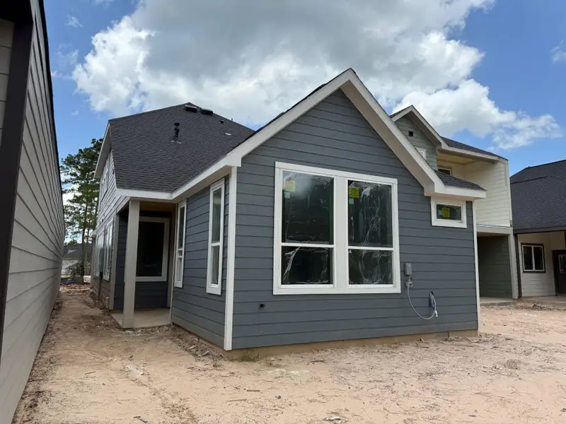 Front exterior of a new home in Kresston, Montgomery, TX, highlighting curb appeal (Image 1). Front exterior of a new home in Kresston, Montgomery, TX, highlighting curb appeal (Image 1).