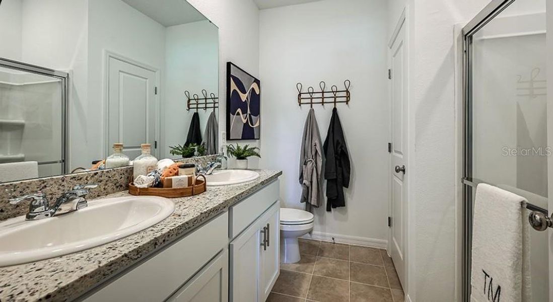 Furnished interior view inside a new home in Westview Community Group Page, Kissimmee (Image 8).