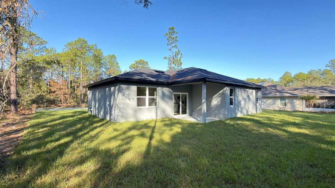 Exterior details and patio area of a home in , Citrus Springs (Image 16).