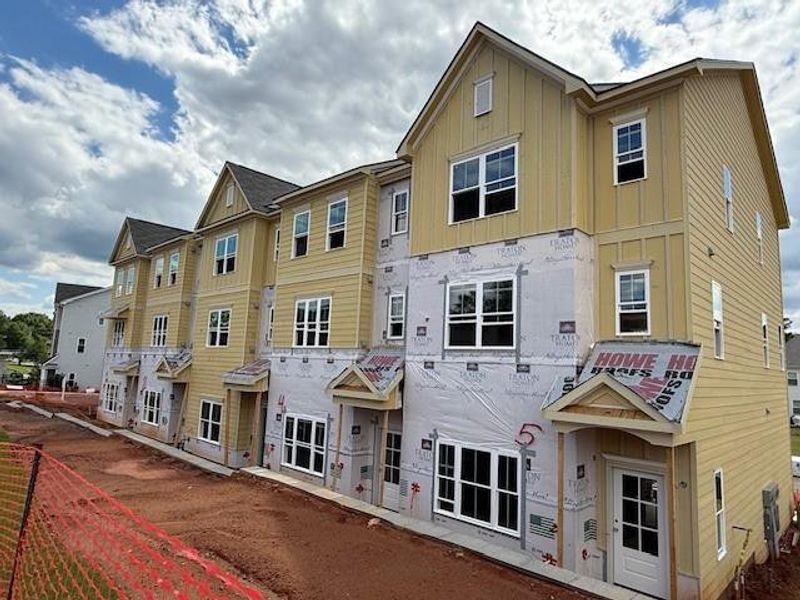 Front exterior of a new home in East Park Village, Kennesaw, GA, highlighting curb appeal (Image 29).