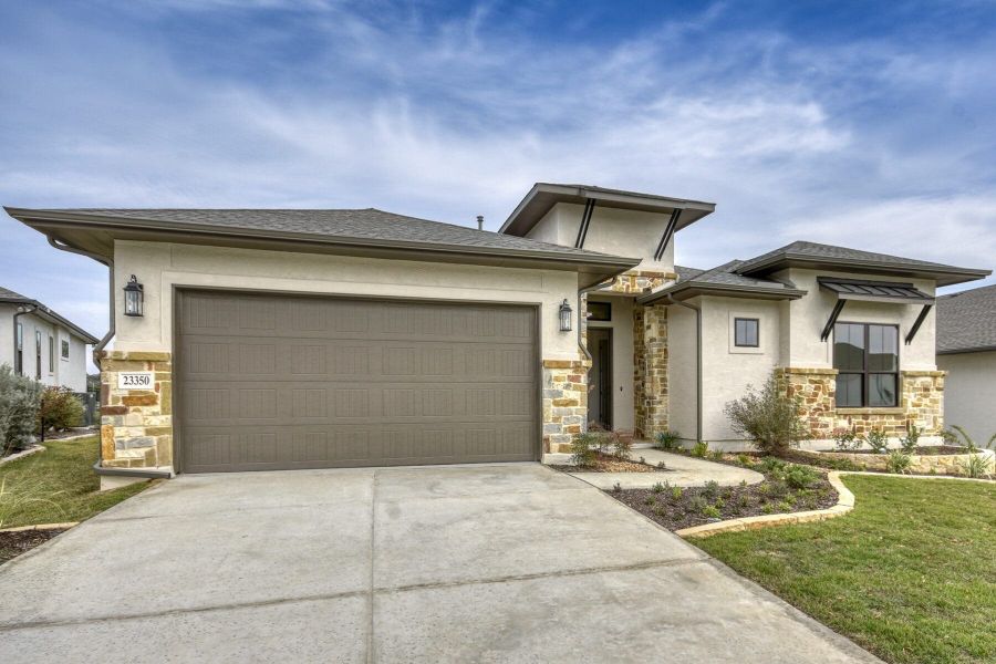 Front exterior of a new home in El Sonido at Campanas, San Antonio, TX, highlighting curb appeal (Image 23).