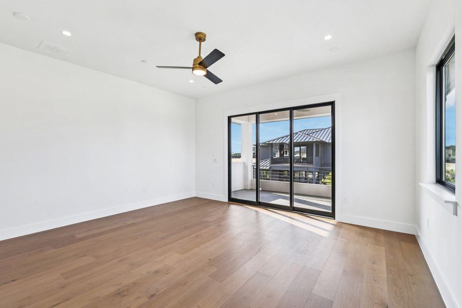 Gameroom with light wood-style flooring, recessed lighting, and ceiling fan