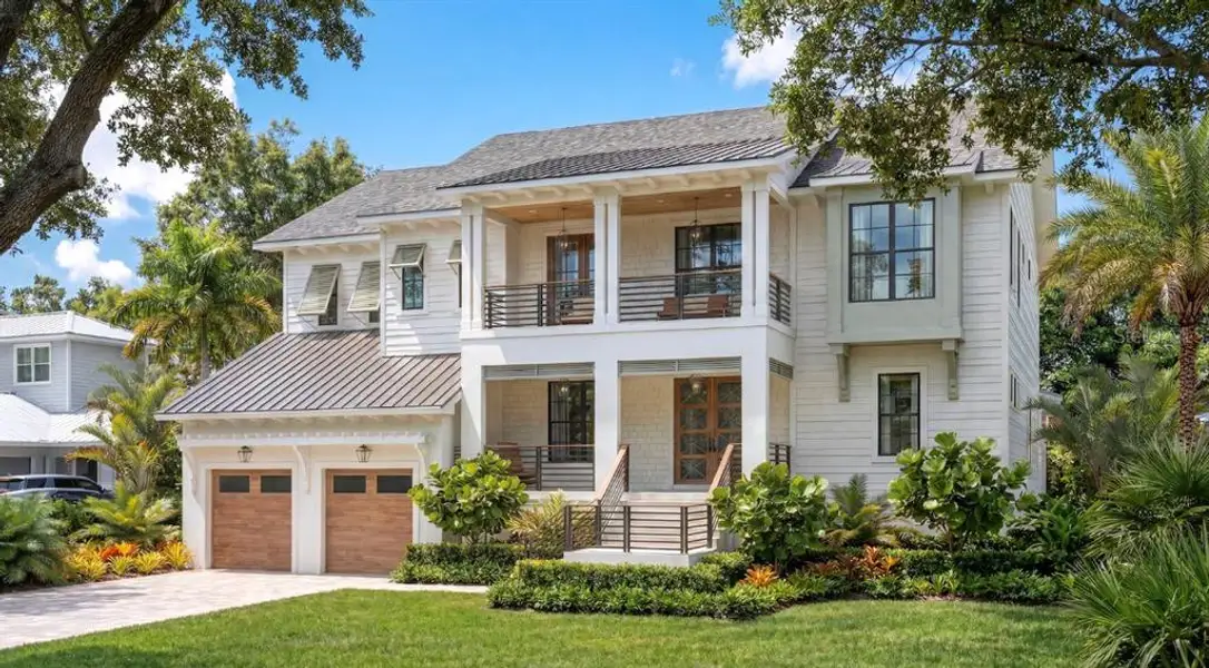 Front exterior of a new home in , Tampa, FL, highlighting curb appeal (Image 1). Front exterior of a new home in , Tampa, FL, highlighting curb appeal (Image 1).
