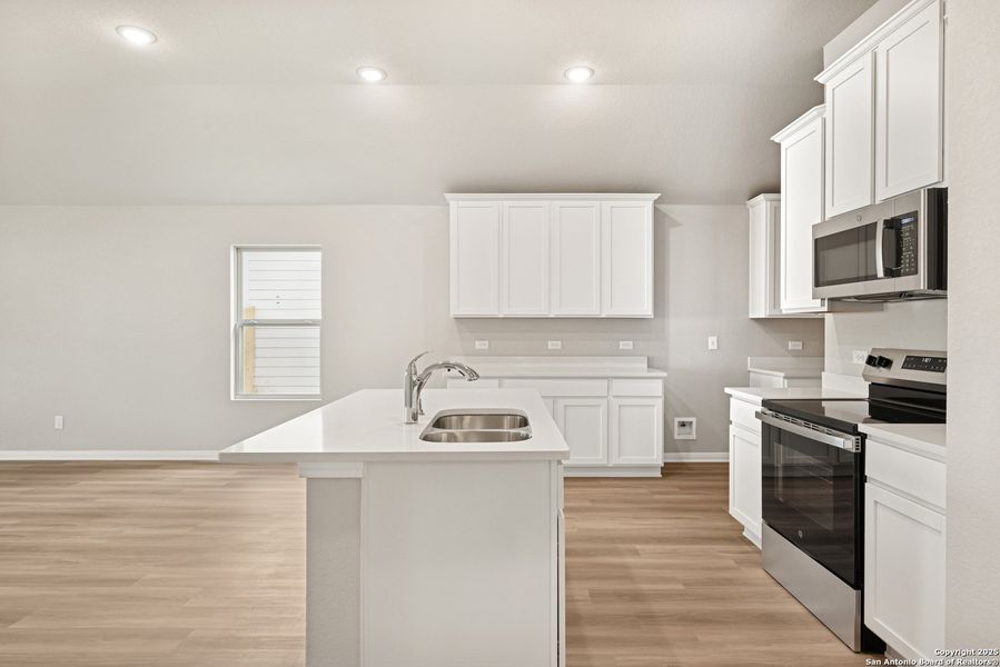 Furnished interior view inside a new home in Greenspoint Heights, Seguin (Image 7).