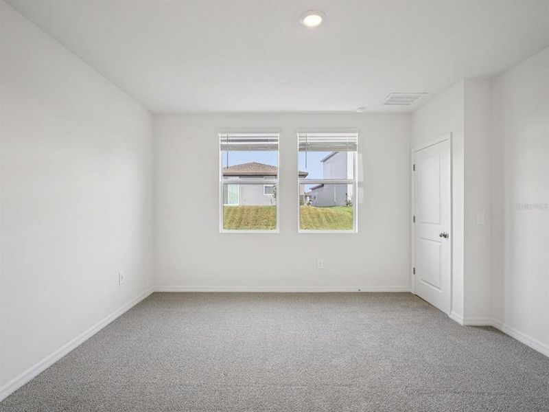 Spacious, unfurnished interior of a new home in Leyland Preserve - Premier Series, Brooksville (Image 18).