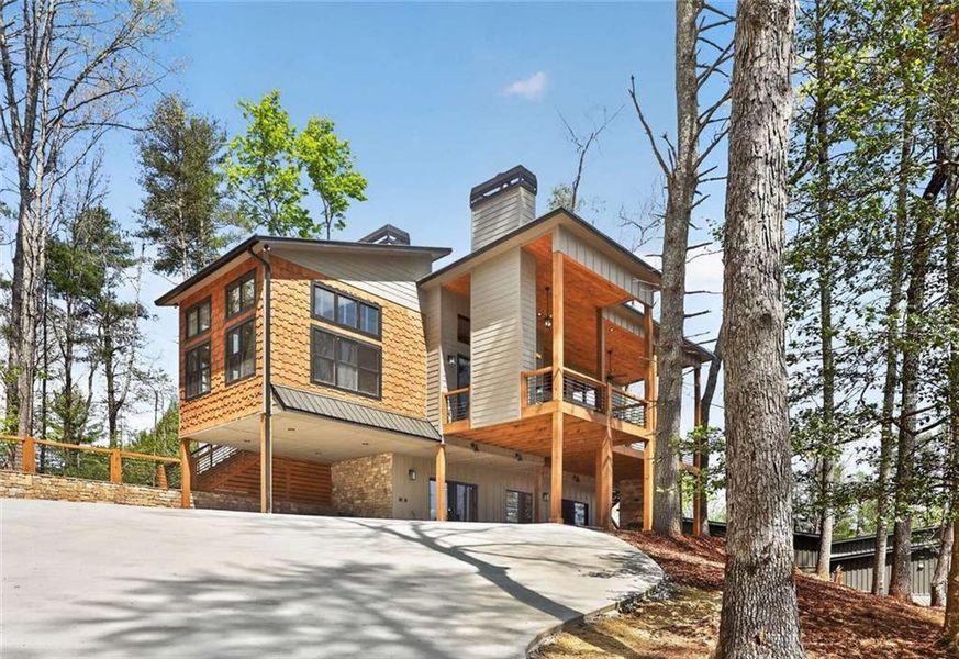 Front exterior of a new home in , Ellijay, GA, highlighting curb appeal (Image 1). Front exterior of a new home in , Ellijay, GA, highlighting curb appeal (Image 1).
