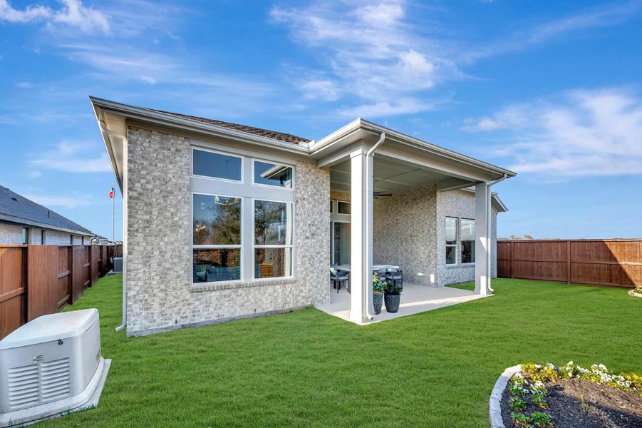 Representative exterior details of a home built from the The Begonia by David Weekley Homes in Meridiana - Ascent Collection, Manvel (Image 4).