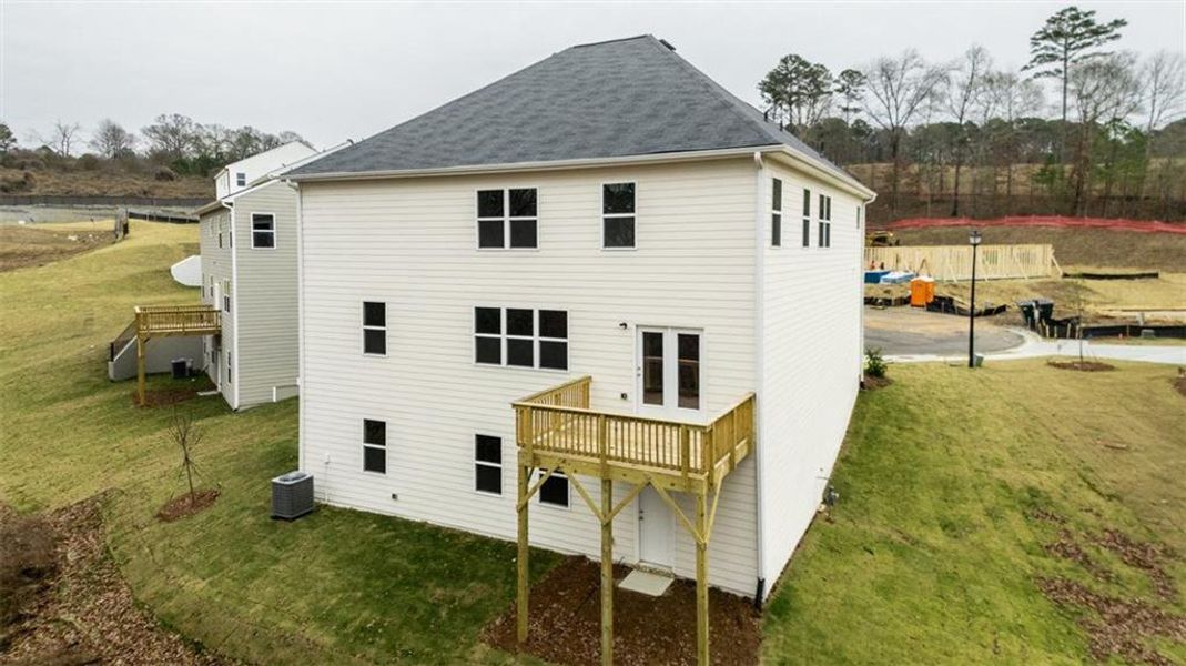 Exterior details and patio area of a home in Brooks Station, Dacula (Image 2).