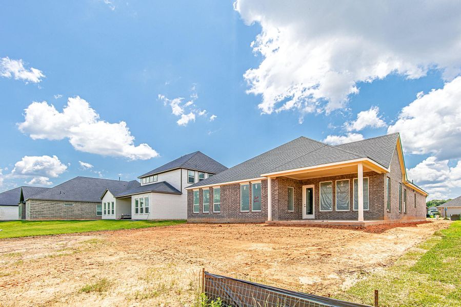 Exterior details and patio area of a home in WaterStone, Montgomery (Image 24). Exterior details and patio area of a home in WaterStone, Montgomery (Image 24).