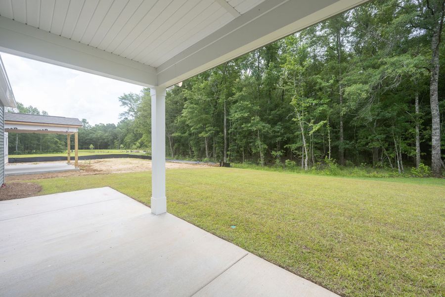 Large Covered Patio on Wooded Lot. Large Covered Patio on Wooded Lot.