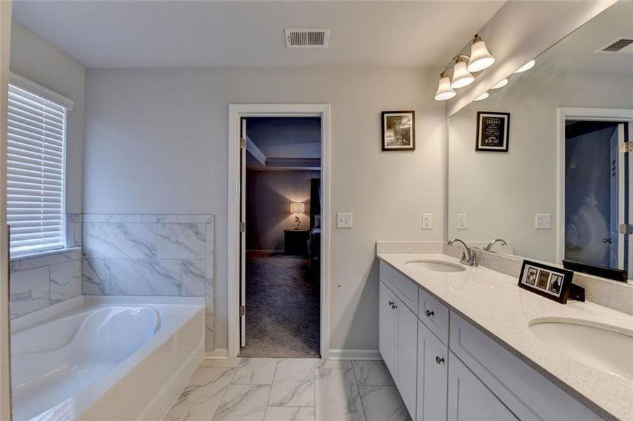 Furnished interior view inside a new home in Adagio, Dacula (Image 28).