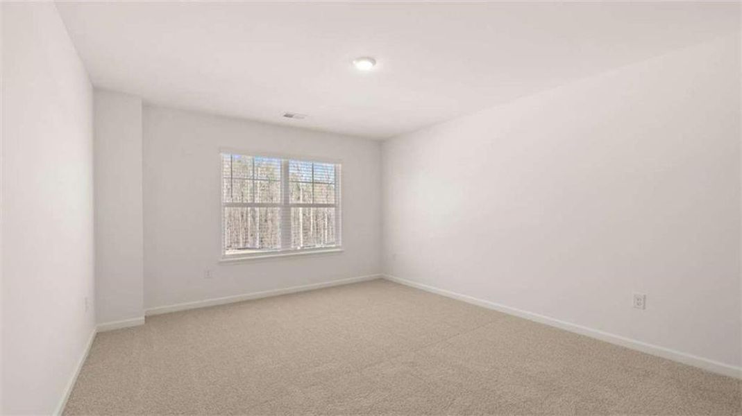 Spacious, unfurnished interior of a new home in Brooks Station, Dacula (Image 31).