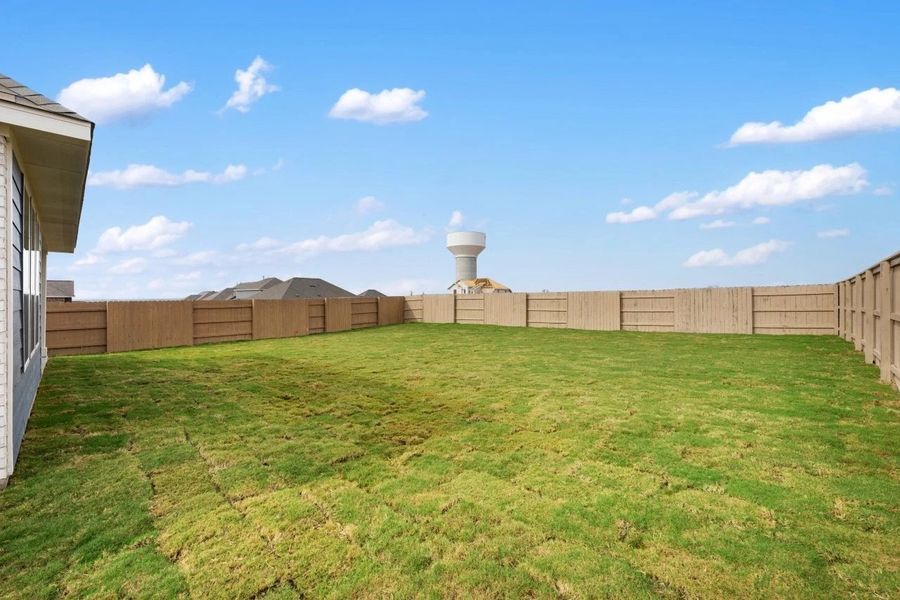 Exterior details and patio area of a home in The Colony 50s, Bastrop (Image 31).