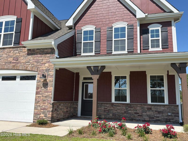 Front exterior of a new home in Legacy Lakes, Aberdeen, NC, highlighting curb appeal (Image 13). Front exterior of a new home in Legacy Lakes, Aberdeen, NC, highlighting curb appeal (Image 13).