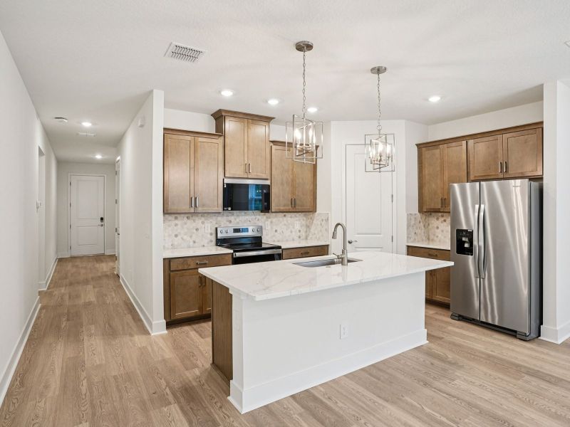 Furnished interior view inside a new home in Ridgehaven - Signature Series, Ormond Beach (Image 3).